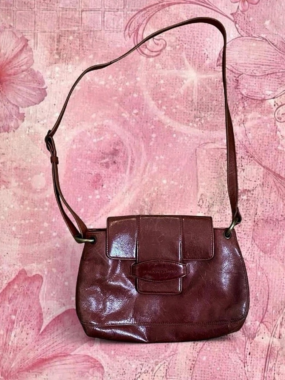 Derek Alexander muted red leather glossy crossbody bag with adjustable strap and